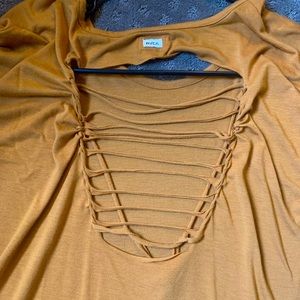 Woman’s RVCA mustard top with cool back detail